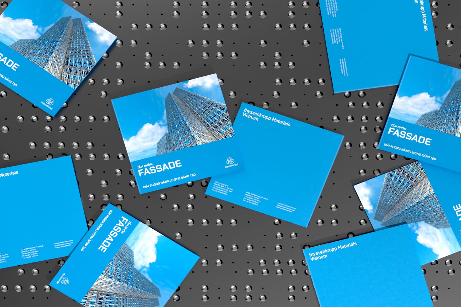 brochures-laying-on-metal-pattern