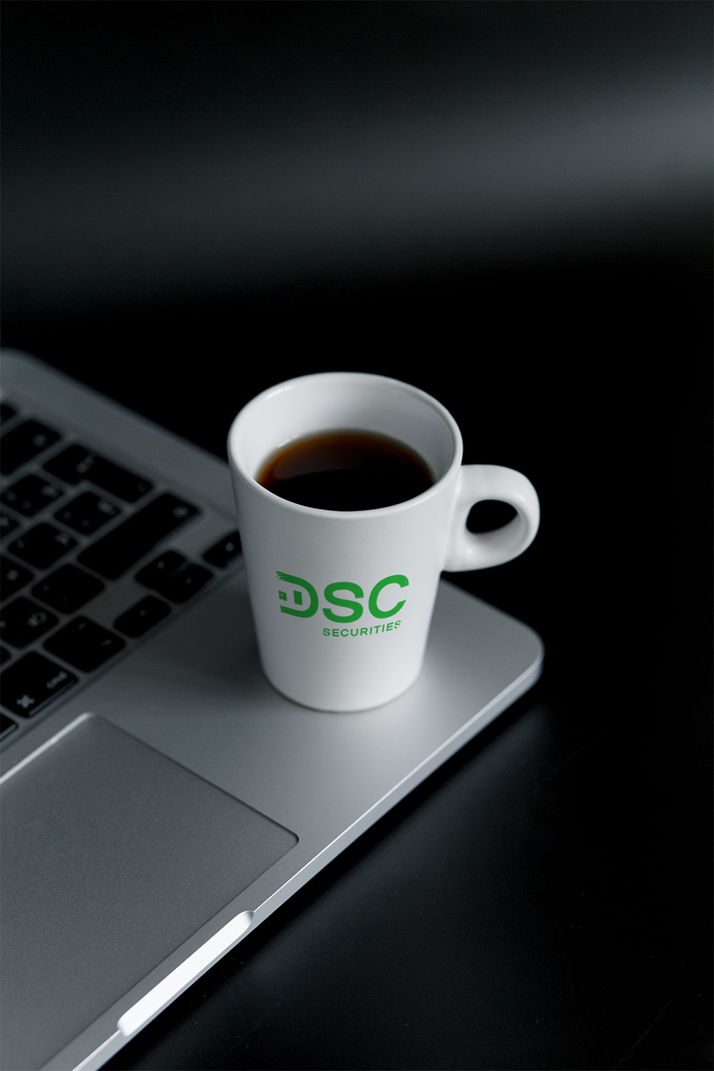 DSC Cup placing on laptop mock-up