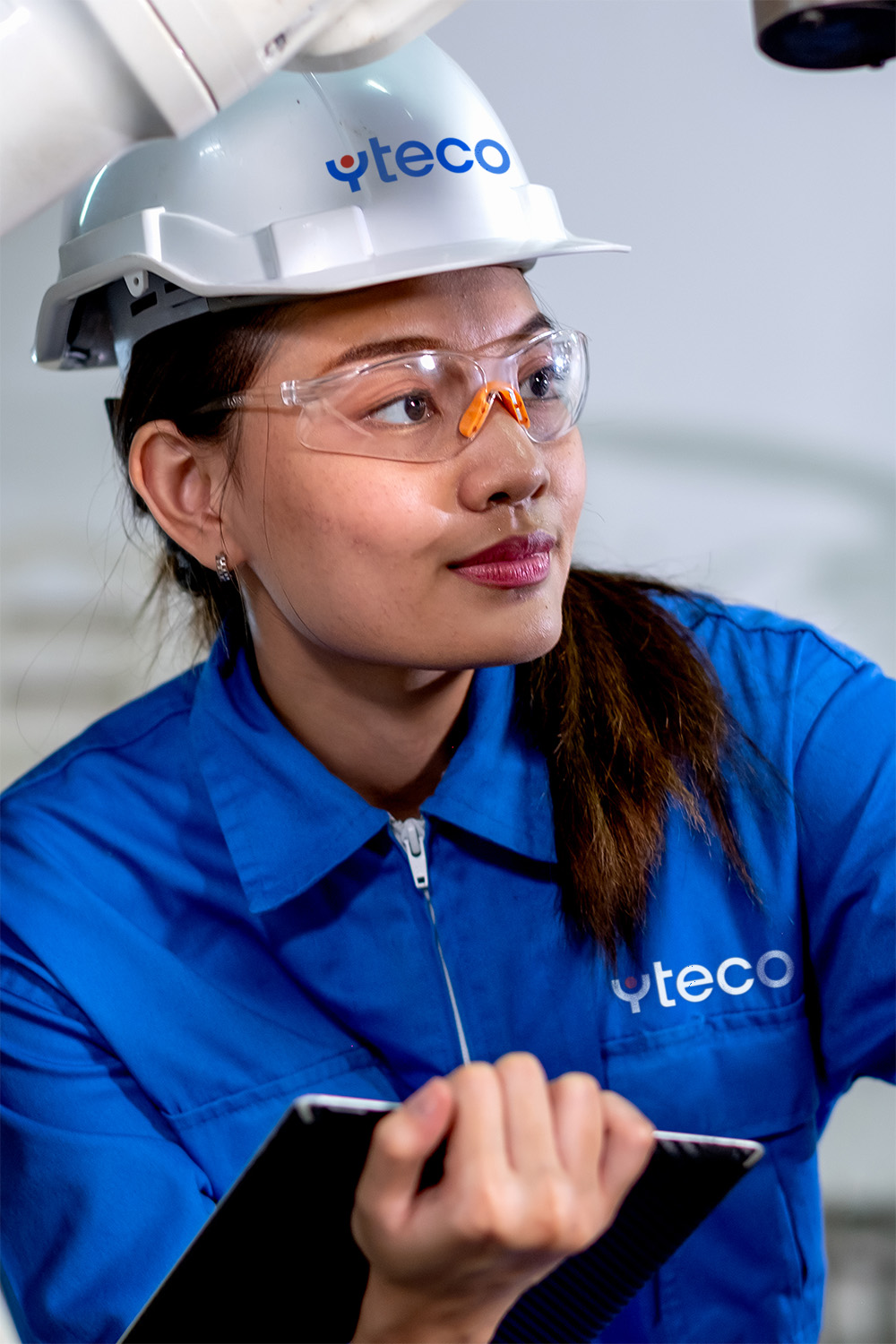 YTECO women wearing blue uniform design