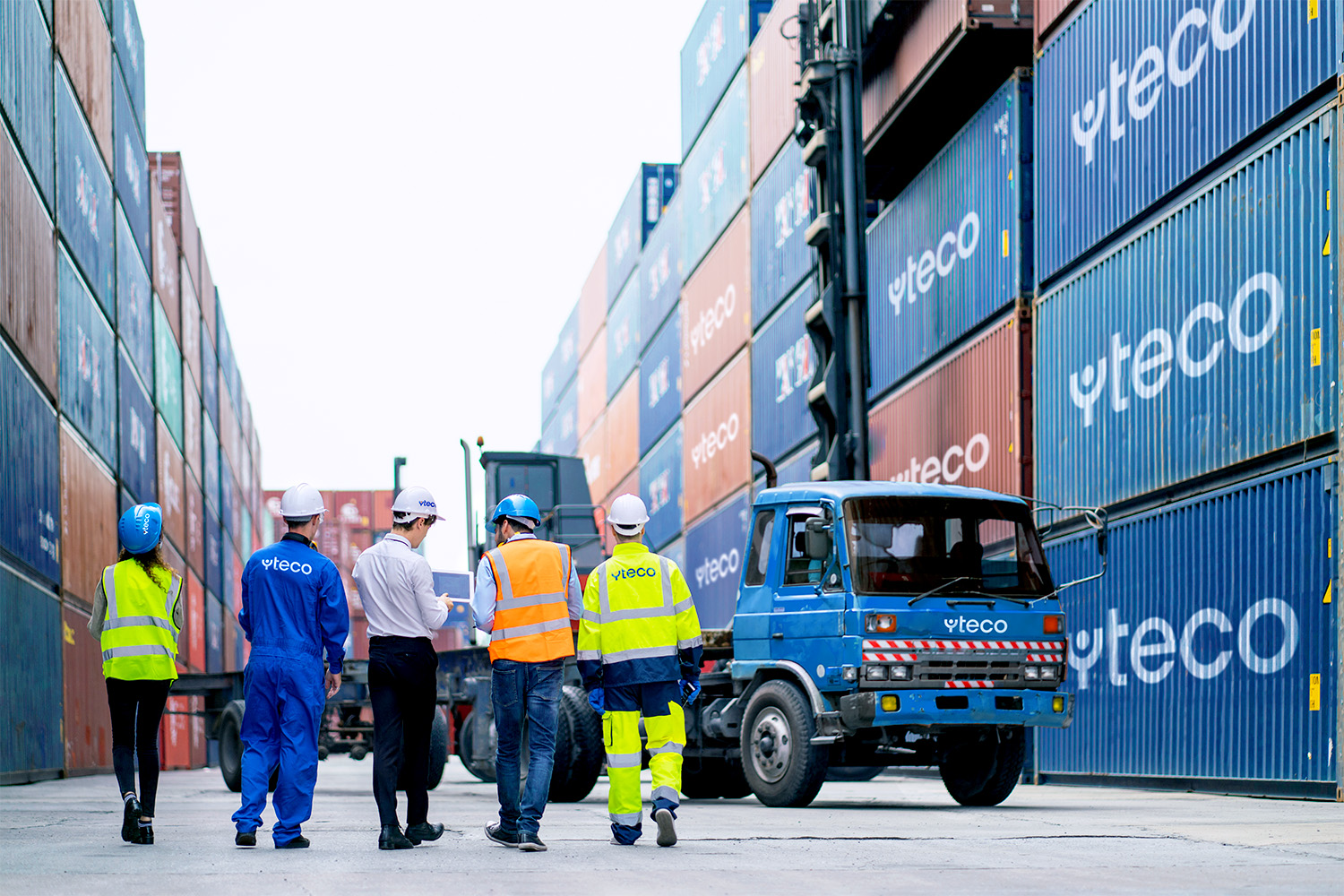 YTECO's employees checking containers