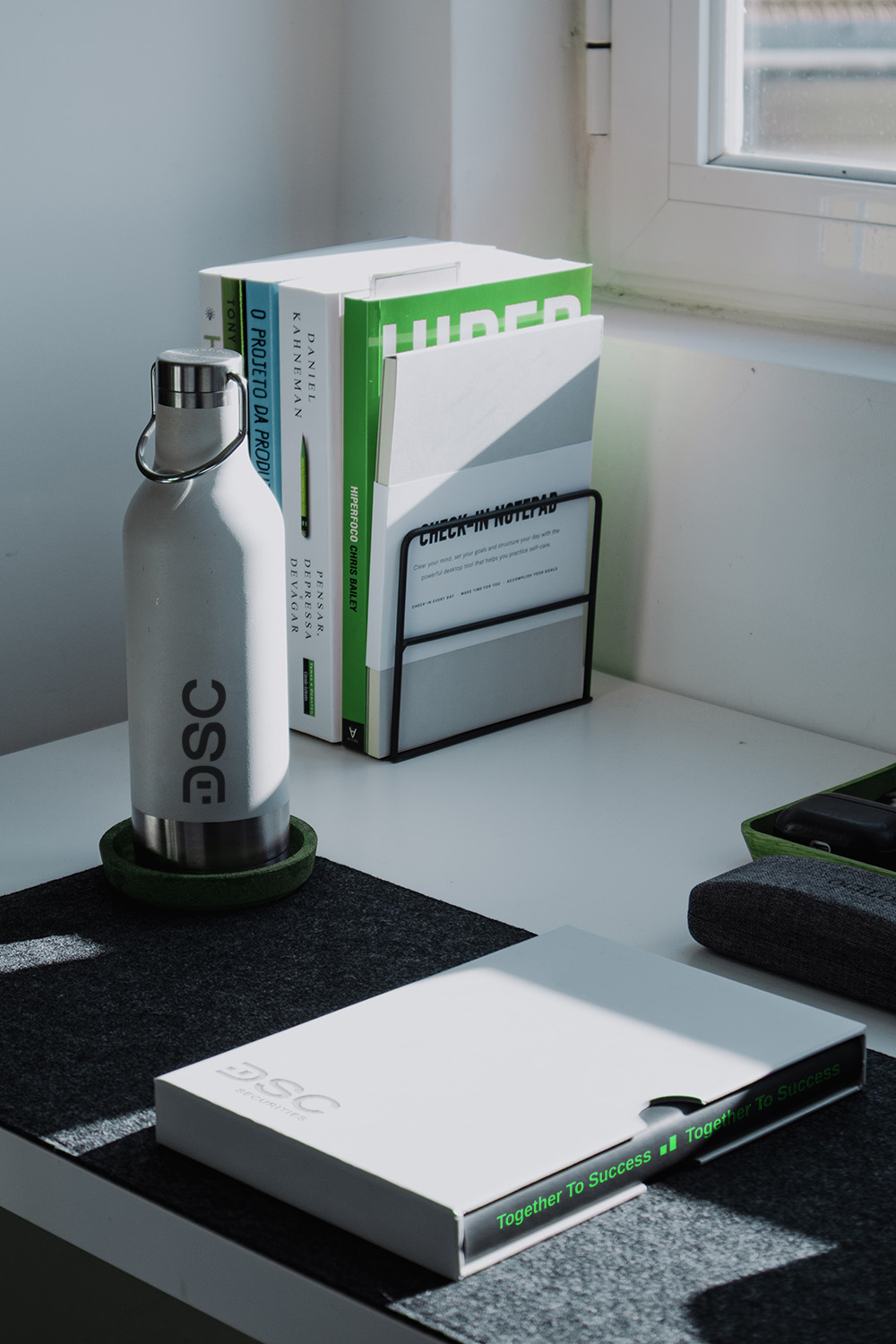 DSC white bottle on office desk mock-up